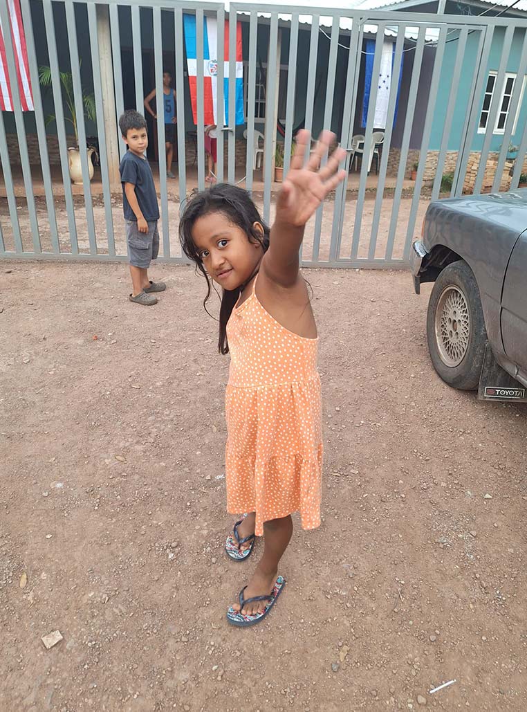 girl waving